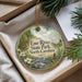 A decorative ornament with a scenic image of Eno River State Park, North Carolina, hanging from a string.