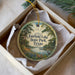 A round ornament with a scenic image of a lake and trees, featuring the text "Fairfield Lake State Park, Texas" on it.