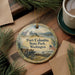 A decorative ornament with a scenic image of Fort Columbia State Park, Washington, featuring a wagon, a building, and a body of water.