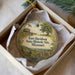 A round ornament in a box, featuring an illustration of Fort Davidson State Historic Site in Missouri.