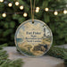 A round ornament with a lighthouse and beach scene, featuring text that reads "Fort Fisher State Recreation Area North Carolina".