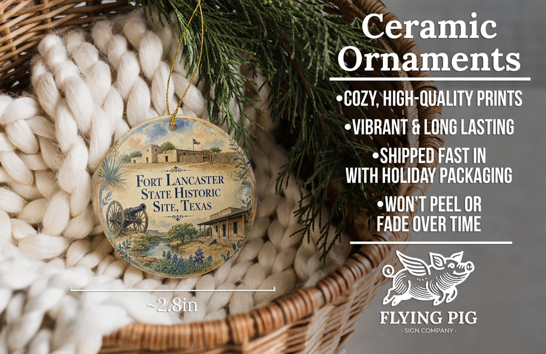 Ceramic ornaments, specifically those featuring Fort Lancaster, Texas, are displayed in a basket. The text highlights the ornaments as "Ceramic Ornaments" with features such as "Cozy, high-quality prints", "Vibrant & long lasting", "Shipped fast in with holiday packaging", and " Won't peel or fade over time". The image also includes a scale for the ornaments, indicating their size is "2.8in".
