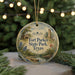 A round ornament with a painting of Fort Parker State Park, Texas, surrounded by greenery and a string of lights.