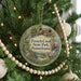 A round ornament hanging on a Christmas tree, featuring illustrations of a bridge, a deer, and a bird, with the text "French Creek State Park, Pennsylvania" displayed on it.