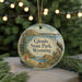 A round ornament with a scenic illustration of Glendo State Park, Wyoming, featuring a bird, a sailboat, and a landscape with mountains and water.