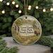A circular ornament with a scenic landscape featuring a waterfall, a cabin, and a bison, along with the text "Good Earth State Park, South Dakota".