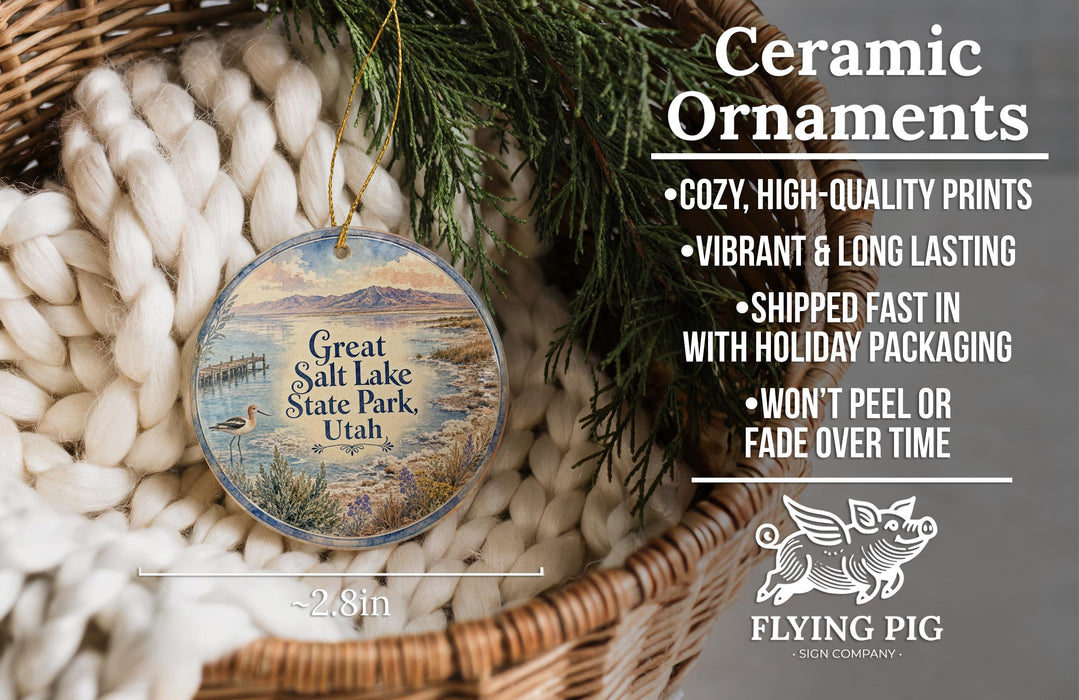 Ceramic ornaments, Great Salt Lake State Park, Utah, with a wicker basket and pine branches in the background.