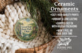 Ceramic ornaments, including a Great Seal State Park ornament, are displayed in a basket with pine branches.