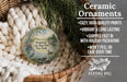 Ceramic ornaments, featuring a painting of a lake and a bird, are displayed in a basket.