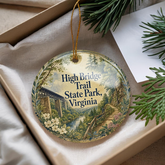 A decorative ornament with a scenic illustration of the High Bridge Trail in Virginia, surrounded by greenery and a bridge.