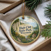 A decorative ornament with a scenic landscape of High Cliff State Park, Wisconsin, hanging from a string.