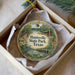 A decorative ornament in a box, featuring a scenic image of Huntville State Park, Texas.