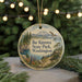 A circular ornament with a scenic landscape of mountains, pine trees, and a lake, featuring the text "Ike Kinswa State Park, Washington".