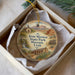 A decorative ornament in a box, featuring illustrations of a historic building, a wagon, and a mountain landscape, with the text "Iron Mission State Park Museum, Utah" displayed prominently.