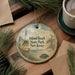 A decorative ornament with a lighthouse and beach scene, featuring text that says "Island Beach State Park, New Jersey".