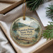 A decorative ornament with a scenic landscape of Kanaskat-Palmer State Park, Washington, displayed in a box with pine branches.