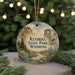 A decorative ornament featuring a scenic landscape with mountains, trees, and a river, with the text "Keyhole State Park, Wyoming" prominently displayed.
