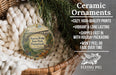 Ceramic ornaments, featuring a scenic image of the Kinzua Bridge in Pennsylvania, are displayed in a woven basket.