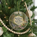 A round ornament hanging on a Christmas tree, featuring a scenic image of Kittatinny Valley State Park in New Jersey.