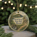 A round ornament with a scenic landscape of Knob Noster State Park, Missouri, featuring a bridge, a lake, and a mountain.