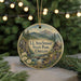 A circular ornament with a scenic landscape featuring a mountain, forest, and waterfall, along with the text "LL. STUB STEWART STATE PARK, OREGON".
