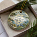 A decorative ornament with a scenic image of Lake Arrowhead State Park, Texas, featuring a sailboat, flowers, and a landscape.