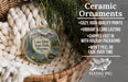 Ceramic ornaments, including a round ornament with a scenic image of Lake Elmo State Park, Montana, hanging from a wicker basket.