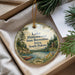 A round ornament with a scenic image of Lake Hiddenwood State Recreation Area in South Dakota, featuring a lake, mountains, and a cabin.