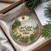 A round ornament with a scenic landscape of Lake Logan State Park, Ohio, featuring a bird, deer, and a cabin.