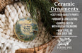Ceramic ornaments, featuring a landscape scene with mountains and a lake, are displayed in a basket.