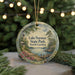 A round ornament with a scenic landscape of Lake Norman State Park, North Carolina, featuring a lighthouse, trees, and a body of water.