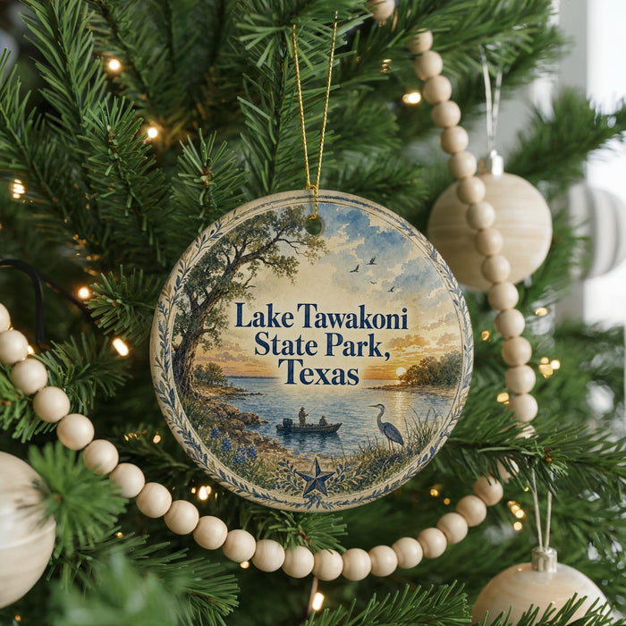 A round ornament hanging on a Christmas tree, featuring a scenic image of Lake Tawakoni State Park, Texas.