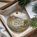 A decorative ornament with a scenic image of Leasburg Dam, Leasburg State Park, and New Mexico, hanging from a string.