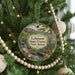 A round ornament hanging on a Christmas tree, featuring a scenic landscape of Lebanon State Forest, New Jersey.