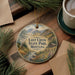 A round ornament with a scenic landscape of mountains, trees, and a stream, featuring the text "Lost Creek State Park, Montana".