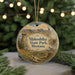 A circular ornament featuring a scenic landscape of mountains, with the text "Makoshika State Park, Montana" prominently displayed.
