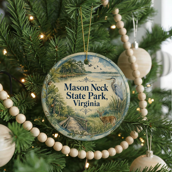 A round ornament hanging on a Christmas tree, featuring a scenic image of Mason Neck State Park, Virginia.