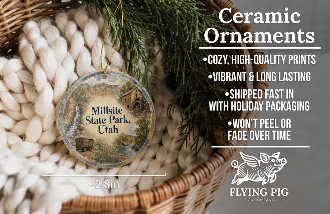 Ceramic ornaments, specifically a round ornament with a scenic image of Millsite State Park, Utah, hanging from a wicker basket.
