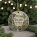 A round ornament with a scenic landscape featuring Minewaska State Park, New York, hanging from a string.