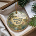 A decorative ornament with the text "Mission Tejas State Park, Texas" is displayed in a box, surrounded by pine branches and greenery.