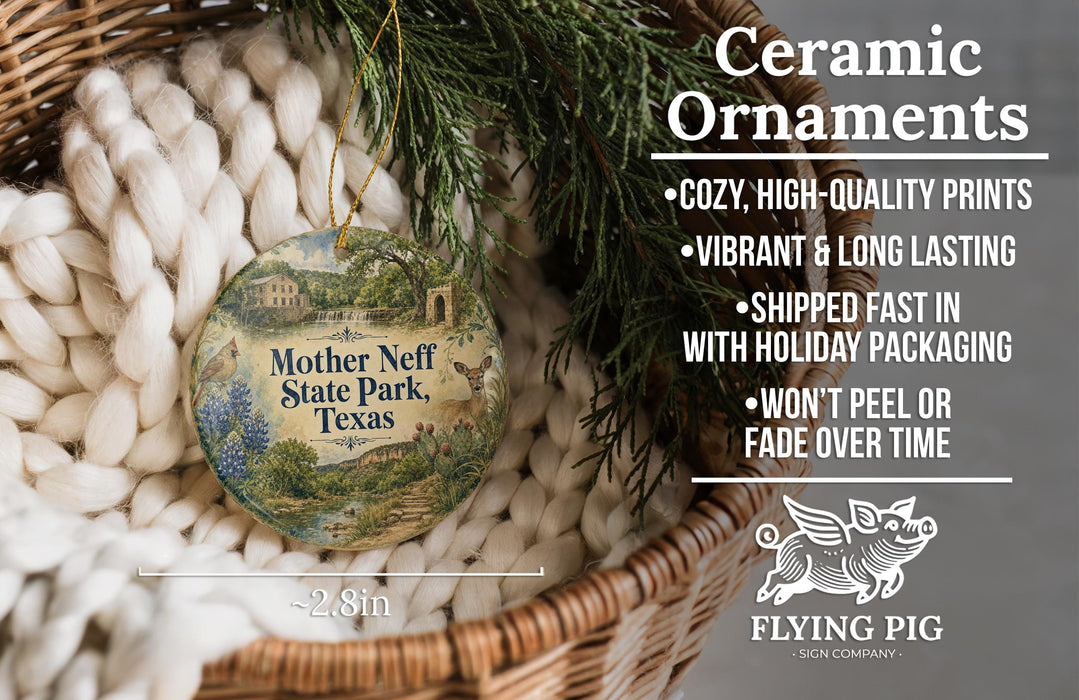 Ceramic ornaments, including a Mother Neff State Park ornament, are displayed in a basket with pine branches.