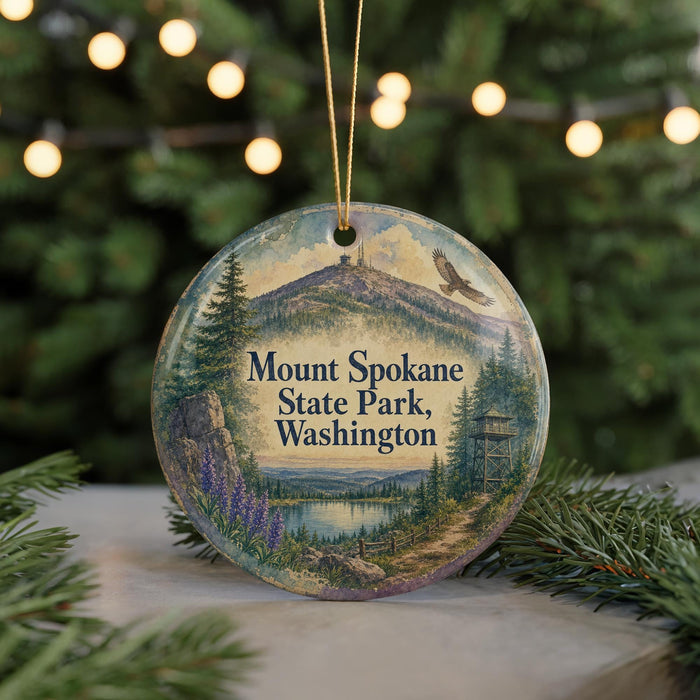 A round ornament with a scenic mountain landscape and text that reads "Mount Spokane State Park, Washington".