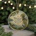 A circular ornament with a scenic image of a lake, trees, and a bird, along with the text "Mousetail Landing State Park, Tennessee".