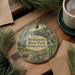 A decorative ornament featuring a scenic landscape of Neshaminy State Park, Pennsylvania, with a bird and a waterfall in the background.