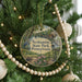 A round ornament hanging on a Christmas tree, featuring a scenic image of Neshaminy State Park, Pennsylvania.