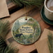 A decorative ornament featuring a black panther in a forest setting, with text that reads "Panther State Forest, West Virginia".