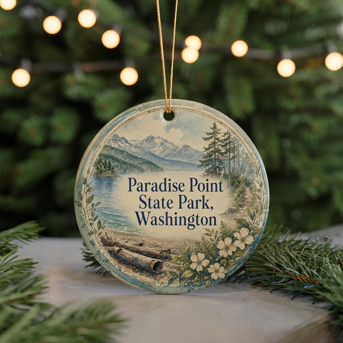 A round ornament with a scenic landscape of mountains, pine trees, and a lake, featuring the text "Paradise Point State Park, Washington".