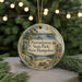 A circular ornament with a scenic landscape of Pawtuckaway State Park, New Hampshire, featuring a bird, pine trees, and a lake.