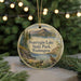 A circular ornament featuring a scenic landscape of Pearyrin Lake, State Park, and Washington, with a bird perched on a tree branch in the foreground.
