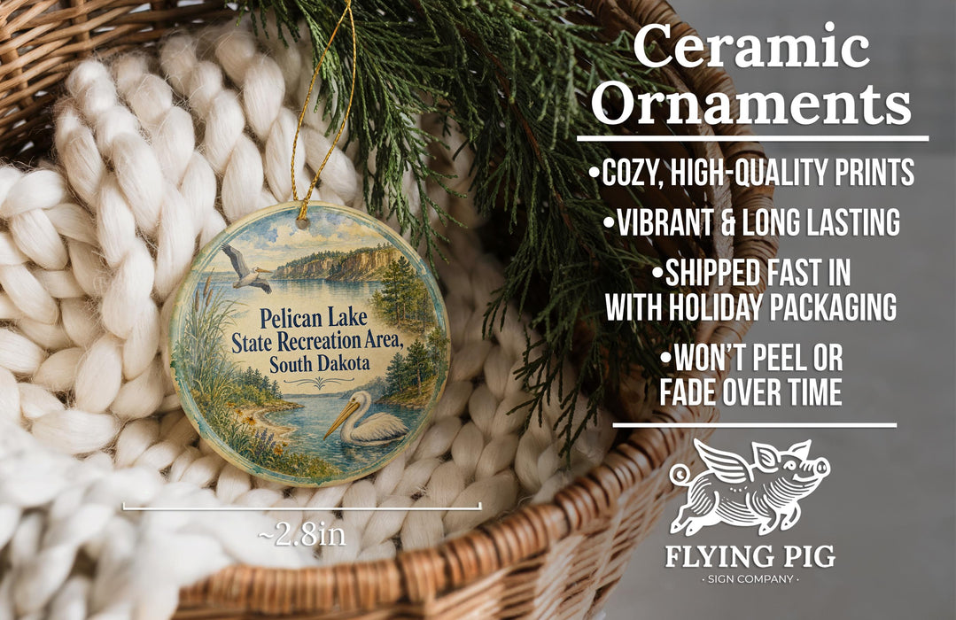 Ceramic ornaments, featuring a bird and a landscape, are displayed in a basket.